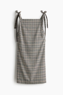 Vestido con lazos