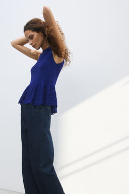 Top en punto pointelle con peplum - H&m фото 4