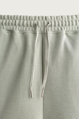 BERMUDA JOGGER RELAXED FIT INTERLOCK / verde lavado - Zara фото 12