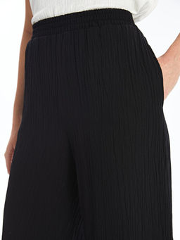 Beli Lastikli D?z Geni? Pa?a Kad?n Pantolon