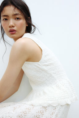 Top en punto pointelle con peplum - H&m фото 4