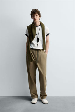LIMITED EDITION RELAXED FIT PLEATED TROUSERS