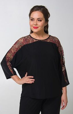 Великолепная блуза свободного покроя из тонкого шелковистого  трикотажа. Рукава летучая мышь