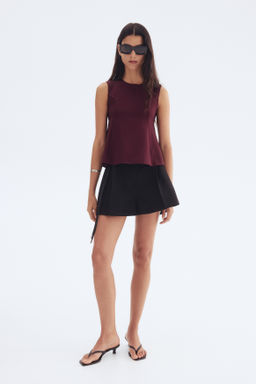 Top interlock con peplum - H&m фото 4