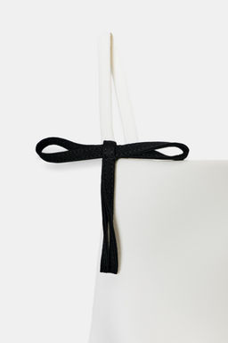 STRAPPY TOP WITH BOWS