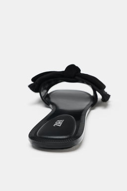 SPLIT SUEDE BOW SANDALS