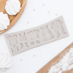 Молд для заливки «Одежда для ребёночка», силикон, 17×6,3 см, розовый