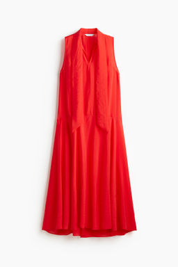 Vestido de organza con lazada