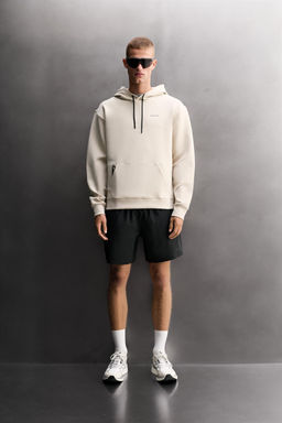 SUDADERA T?CNICA CAPUCHA / crudo-blanco