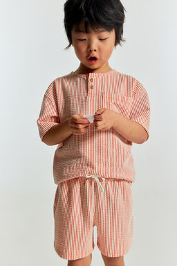 Camiseta panadera y pantalon corto