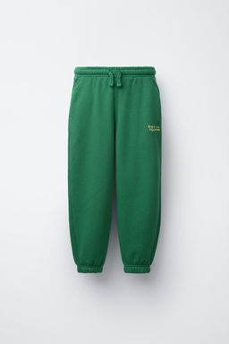 RAISED SLOGAN FLEECE JOGGERS
