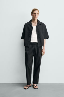 PANTAL?N RELAXED FIT EFECTO RELIEVE / Negro