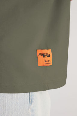 Gri Oversize/Genis Kesim Kabar?k Yaz? Bask?l? Etiketli S?f?r Kol T-Shirt/Atlet TMNSS24AL00005