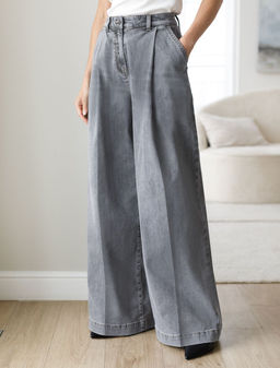 Широкие джинсы с защипами из эластичного денима