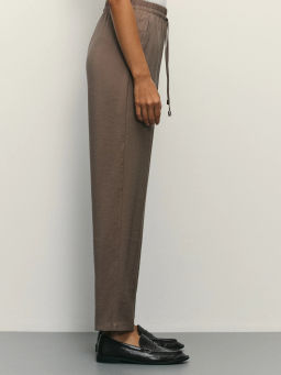 Зауженные брюки с эластичным поясом / Zarina фото 3