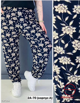 Брюки в цветочек женские