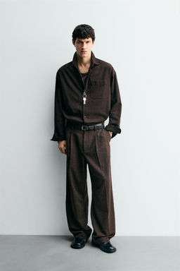 PLEATED TROUSERS WITH BUTTONS