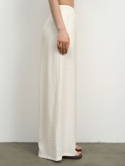 Брюки из вискозы 10367 молочные