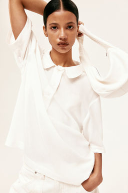 Polo en crepe transparente