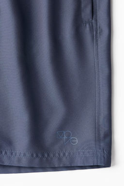 Pantalon corto a media pierna en DryMove - H&m фото 7