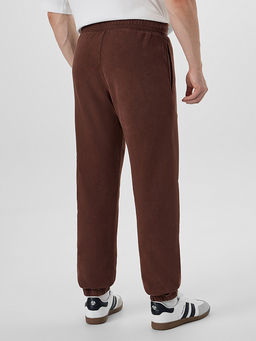 Брюки мужские коричневые с обработкой эйсид