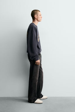 WASHED SWEATSHIRT WITH SLOGAN PRINT
