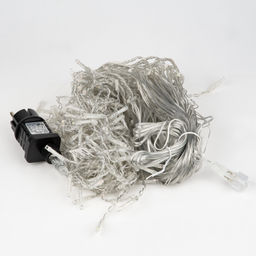 ULD-B12006-195/TTK MULTI IP44 Бахрома светодиодная с эффектом мерцания, 12м. Соединяемая. 195 светодиодов. Разноцветный свет. Провод прозрачный. ТМ Uniel