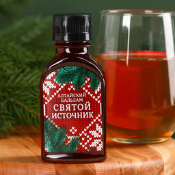 Подарочный набор новогодний «Тепла и уюта»: Чай новогодний травяной 20 г, безалкогольный бальзам 100 мл.