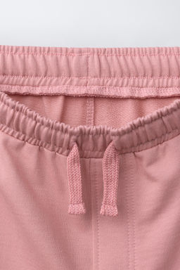 CONJUNTO CAMISETA Y BERMUDA TEXTO / Rosa lavado
