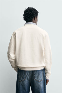 REGULAR FIT PRINTED SLOGAN SWEATSHIRT