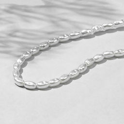 Бусины пластиковые на нити Жемчуг рис 0.7?0.5?0.5 см, (набор 150 шт.), белые