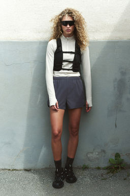 Top de deporte seamless en DryMove con cremallera - H&m фото 3