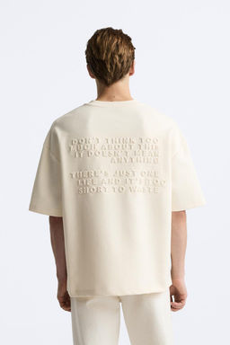 T-SHIRT WITH EMBOSSED SLOGAN - Zara фото 4