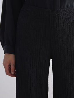 Beli Lastikli Dokulu Geni? Pa?a Kad?n Pantolon