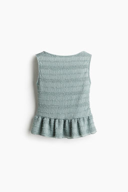 Top con ribetes de volante y peplum