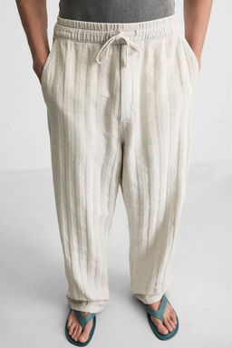 RELAXED FIT JACQUARD TROUSERS - Zara фото 15
