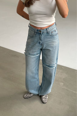 Джинсы свободные с имитацией разрезов Голубой