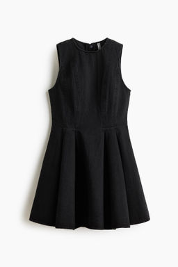 Vestido denim con falda acampanada