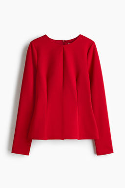 Top de punto con peplum