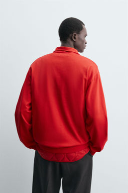 WASHED QUARTER-ZIP SWEATSHIRT