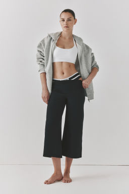 Leggings capri de deporte con SoftMove Wide fit - H&m фото 2