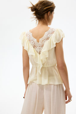 Top de lyocell con volantes - H&m фото 5