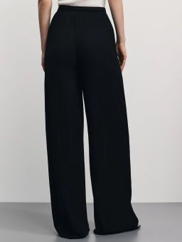 Широкие брюки из фактурной вискозы / Zarina фото 5