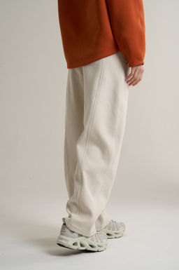 Брюки трикотажные Бежевый ICONIC Knit Track Pants - Anta фото 7