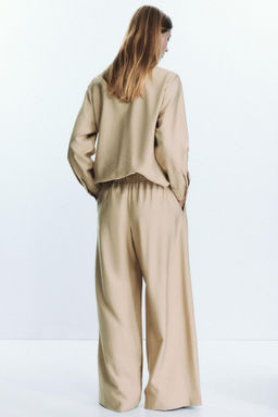 WIDE-LEG TROUSERS WITH ELASTIC WAIST