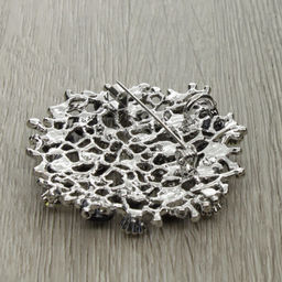 Брошь-подвеска "Калейдоскоп" со вставками из гелиотиса и ювелирного сплава