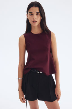 Top interlock con peplum - H&m фото 5