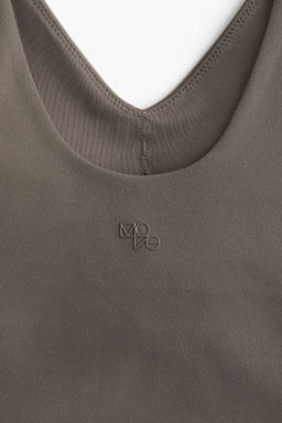 Sujetador de yoga SoftMove Lycra® Light Support - H&m фото 3
