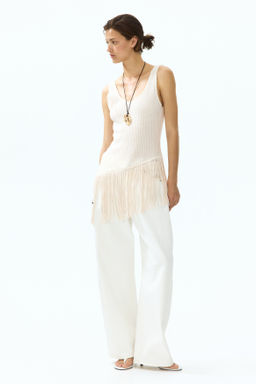 Top asim?trico con flecos - H&m фото 4