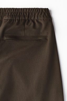 Pantal?n ancho Four-way stretch - H&m фото 10